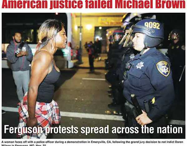 National Guard, police curb Ferguson unrest as protests spread across U.S.