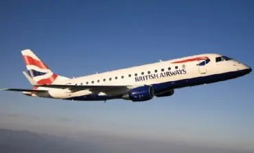 Police say no terror tie seen in attempt to open door on Boston-bound flight