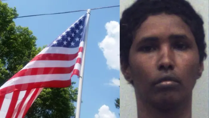 Muslim woman in burqa attacks family with their American Flag