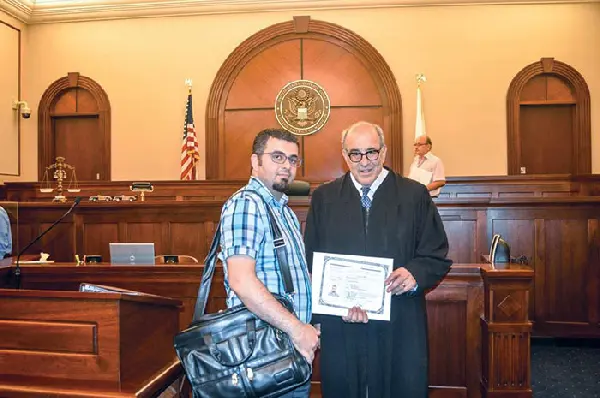 State report highlights immigrants' contributions: Snyder calls for immigration reform