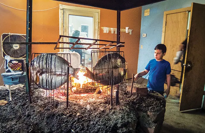 Iraqi American photojournalist documents the journey of refugees in Metro Detroit