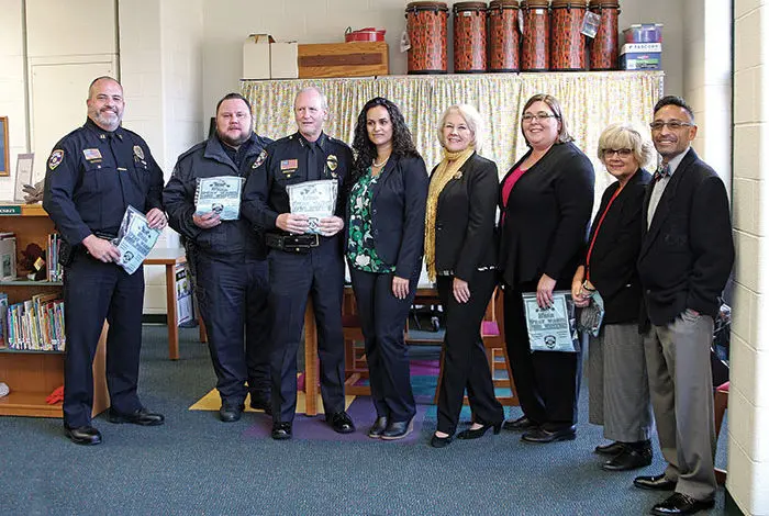 Dearborn Heights police donate winter wear to school children