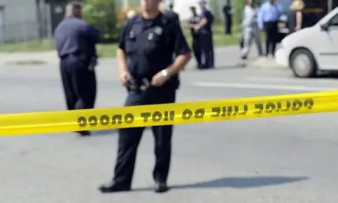 Detroit man executed outside son's school