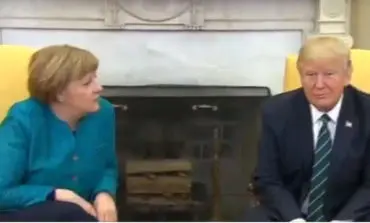 Trump refuses to shake Angela Merkel's hand