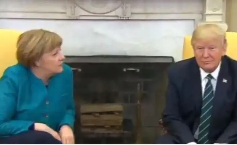 Trump refuses to shake Angela Merkel's hand