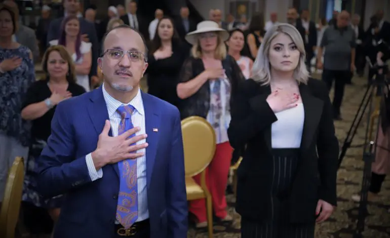 Officials and community members gather to support Dave Abdallah’s re-election campaign kick-off