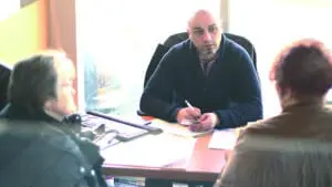 Superior Buick GMC salesman Mike Bazzi with customers. Photo: The AANews