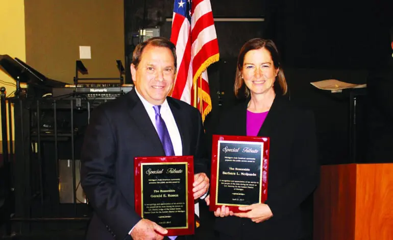 Community organizers honor McQuade and Rosen at farewell dinner