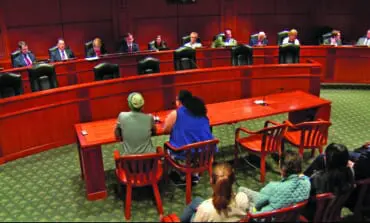 Activists, officials slam State House committee for passing anti-sanctuary bills