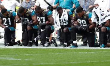 NFL players, managers defy Trump on anthem protests