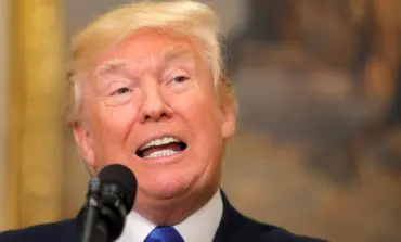 California appeals court lets Trump travel ban go partially into effect