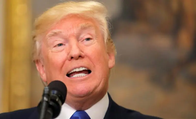 California appeals court lets Trump travel ban go partially into effect