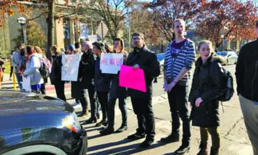 University of Michigan students walk out of class, protesting speech by White nationalist