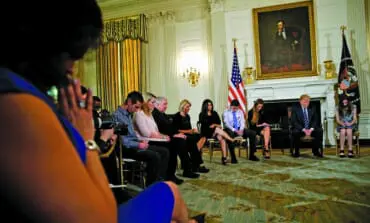 Students protest over gun laws, Trump suggests arming teachers