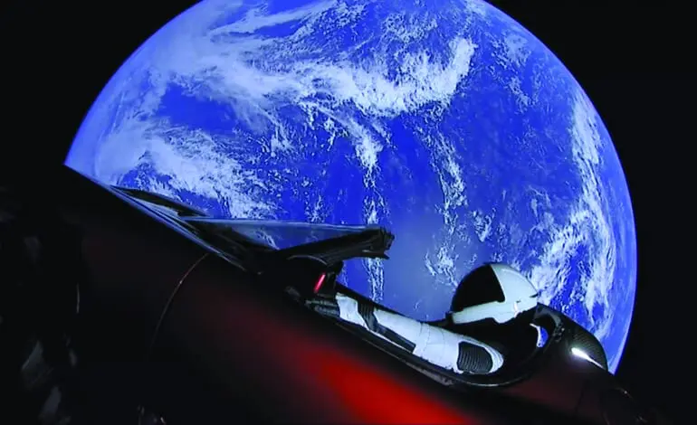 World's most powerful rocket launches electric supercar on path to Mars