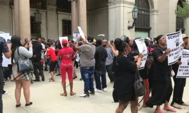 Low-income workers protest Bill Schuette's opposition to Medicaid