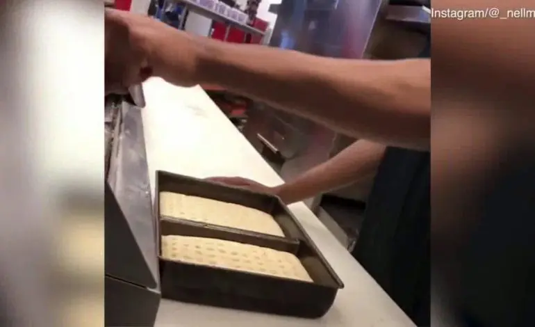 Comerica Park food handler charged for spitting on pizza