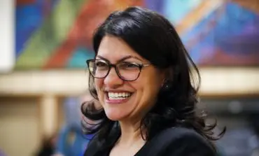 Rashida Tlaib reacts to the COVID relief bill
