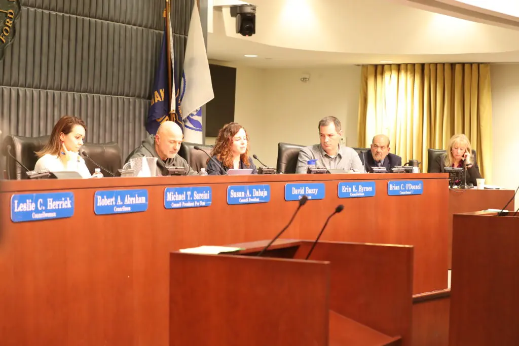 Dearborn City Council members listen to residents comments during the town hall meeting.