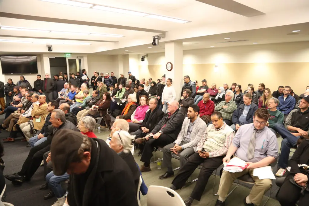 Dearborn residents participate in the town hall meeting.