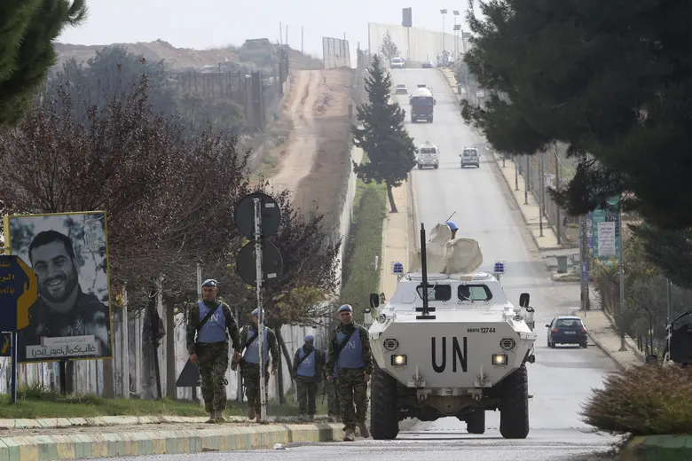U.N peacekeepers patrol the Lebanese side of the Lebanese-Israeli border in the southern village of Kfar Kila, Lebanon, Tuesday, Dec. 4, 2018.