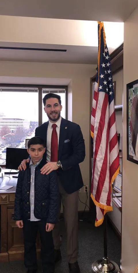State Rep. Abdullah Hammoud with fourth grader 9-year-old Mahdi Nassrallah during his visit to Lansing