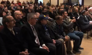 Mourners of New Zealand terror attack victims pack Islamic Center in a show of unity, defiance