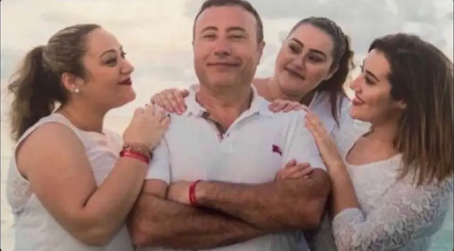 Dr. Hakim surrounded by his daughters Sabah, Linda and Dania