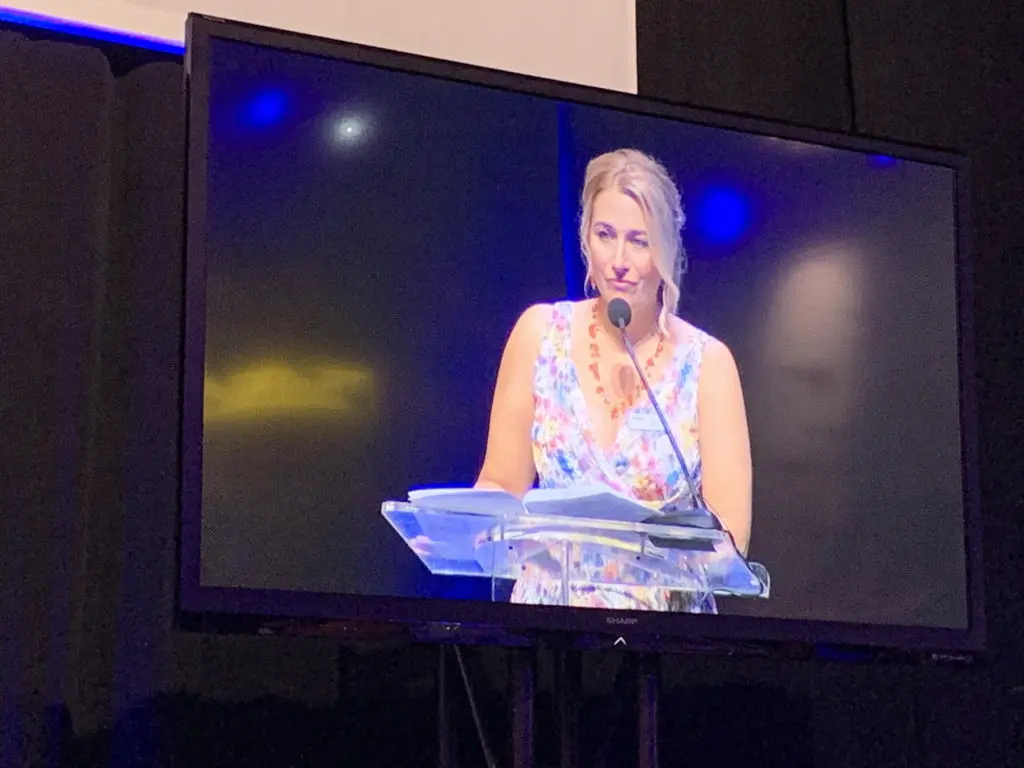 Chad's mother Tammi Carr speaking at the event