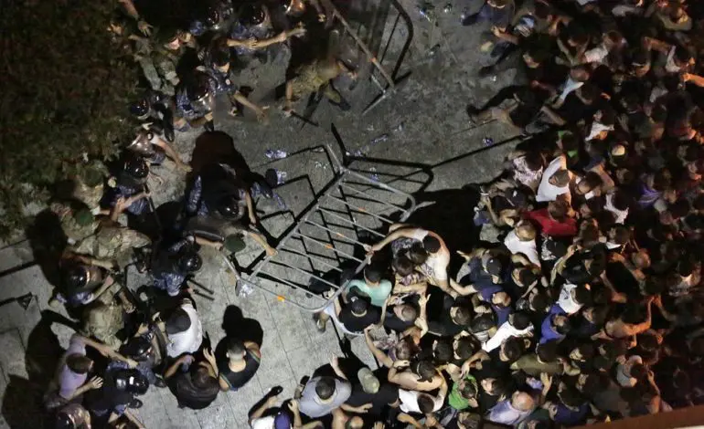 Thousands protest in Lebanon over proposed new taxes, dire economic conditions