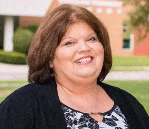 Treasurer Lisa Hicks-Clayton addresses concerns from the residents while keeping positivity a focus