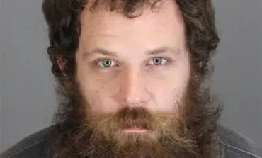 Garden City man charged in carjacking of police vehicle