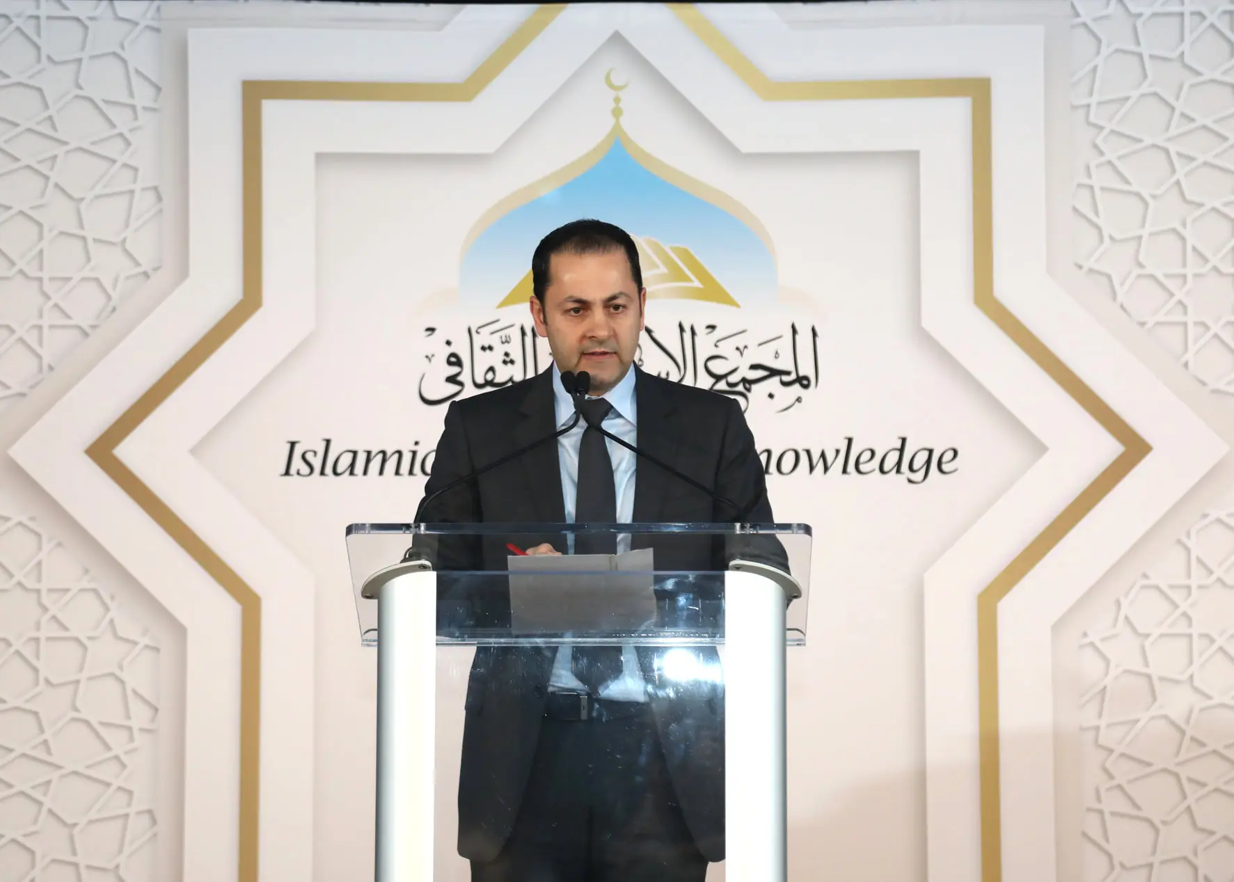 Dr. Ali Berry speaks at a gala and fundraiser for the upcoming Mosque of the Prophet slated for a fall 2022 grand opening in east Dearborn.