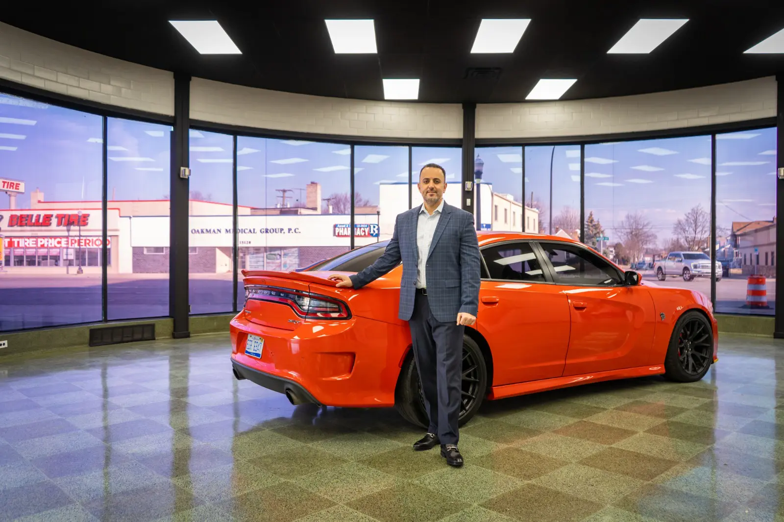 Sam Hussein, owner of MetroTech Automotive Group on Michigan Avenue in east Dearborn. Photo Imad Mohamad/The Arab American News