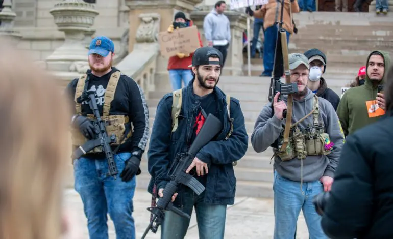 Lansing mayor promises consequences for protests that violate stay-home order