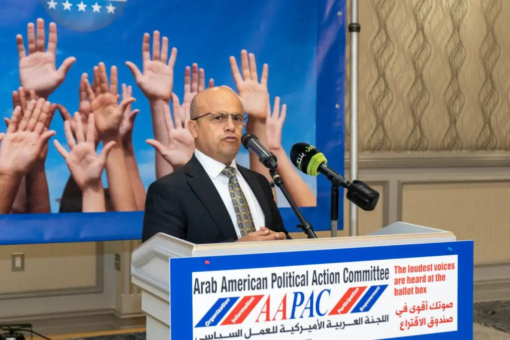 Khalid Shajrah speaking at the event.