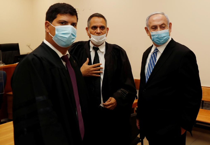 Netanyahu appears in court, becoming first ever Israeli prime minister to be put on trial