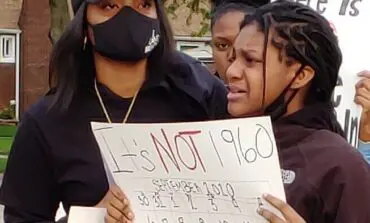 Parents hold protest against racism outside of D7 Board of Education building in Dearborn Heights 