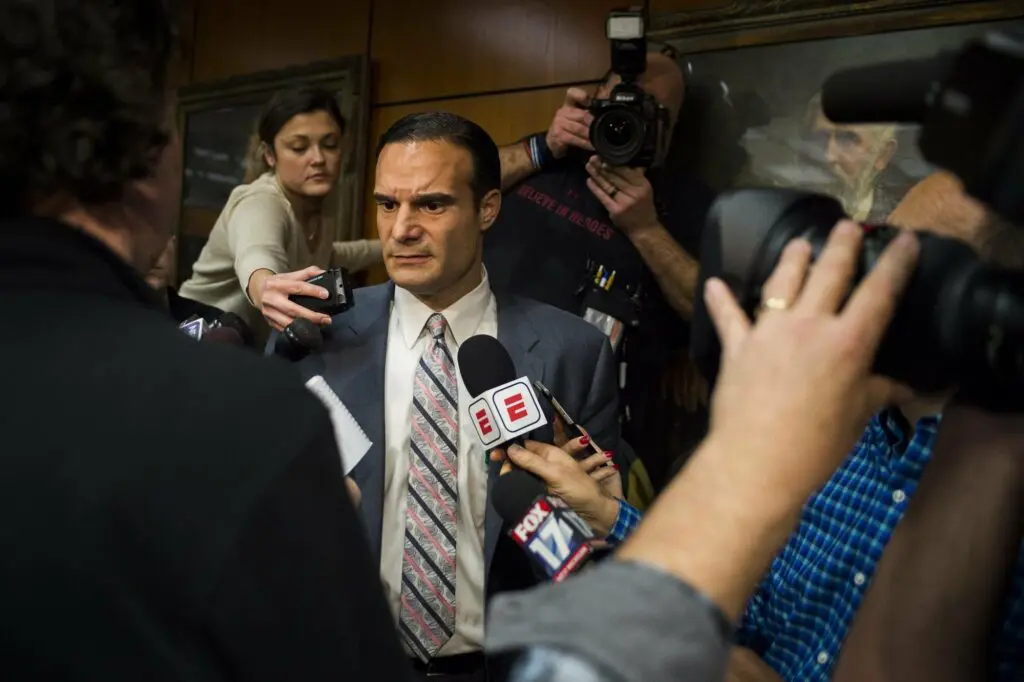 MSU trustee Brian Mosallam speaks to reporters in 2018. Photo: Jake May/The Flint Journal-MLive.com via AP
