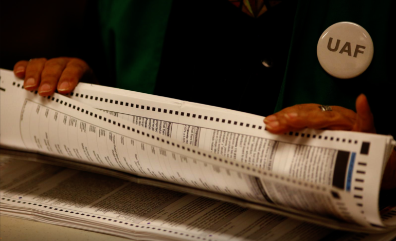 U.S. early voting tops 60 million as historic pace continues