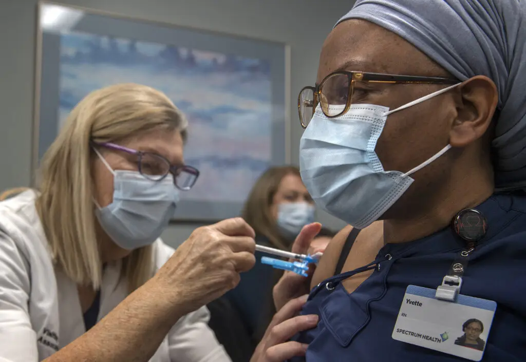 Yvette Kamana, an intensive-care nurse, was one of the first people to get vaccinated against COVID-19 in Michigan.