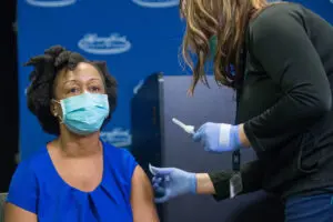Dr. Joneigh Khaldun receives her COVID-19 vaccine at Henry Ford Hospital. Photo courtesy: MDHHS