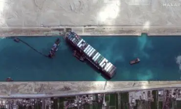 Stuck ship partially freed in the Suez Canal