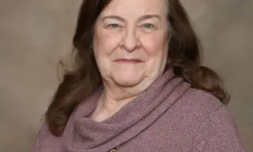 Nancy Bryer puts her name in the hat for a seat on the Dearborn Heights City Council