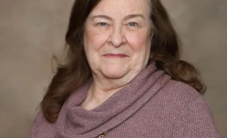 Nancy Bryer puts her name in the hat for a seat on the Dearborn Heights City Council