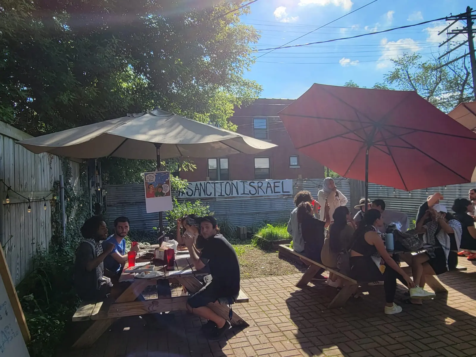 Pie-Sci in Detroit hosts a ‘Pizza and Palestine conversations over pie" event. Photo: Rasha Almulaiki/The Arab American News