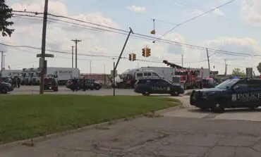 One dead after accident involving a semi and a tow truck