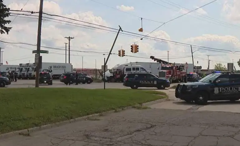 One dead after accident involving a semi and a tow truck