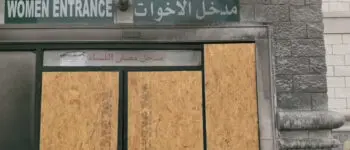 Al-Huda Mosque in Dearborn has a boarded up women's entrance from a arson attack early Saturday. File photo