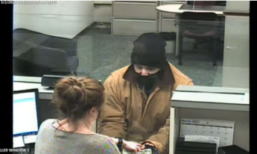 Dearborn bank robbery suspect caught hiding in porta-potty